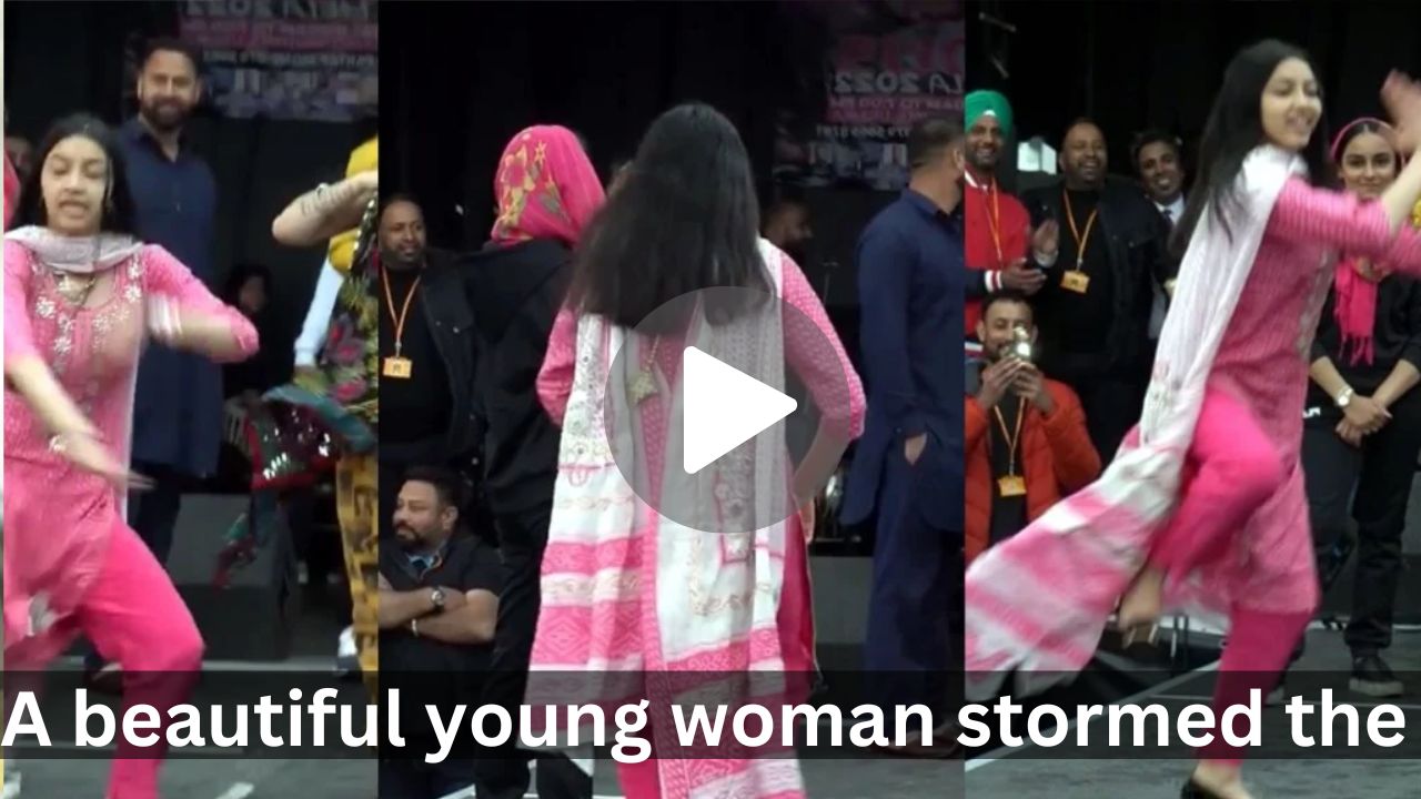 A beautiful young woman stormed the streets with a boisterous dance to Punjabi songs